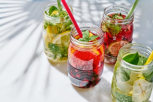 Preview: Detox drink. Different varieties of infused water with lemon, berries and herbs.Detox drink.