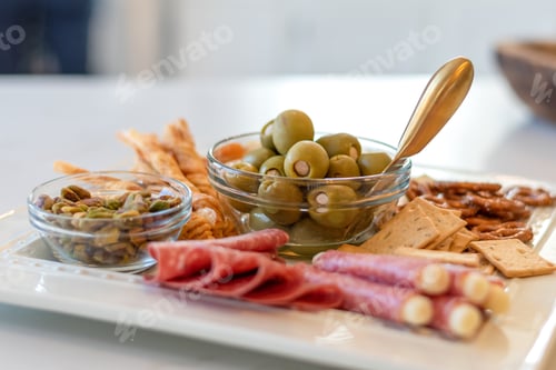 Preview: Closeup of a dish of olives on a charcuterie tray