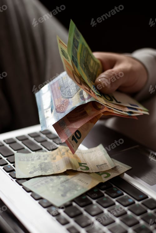 Preview: man working on laptop