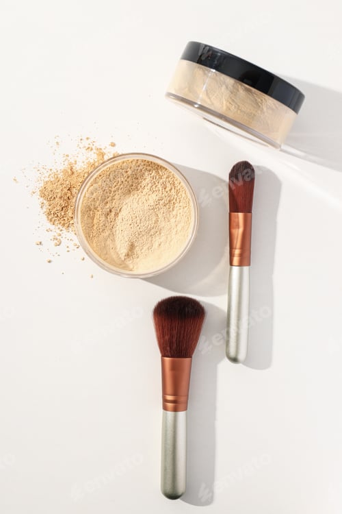 Preview: Face powder with a brush, on a light background.