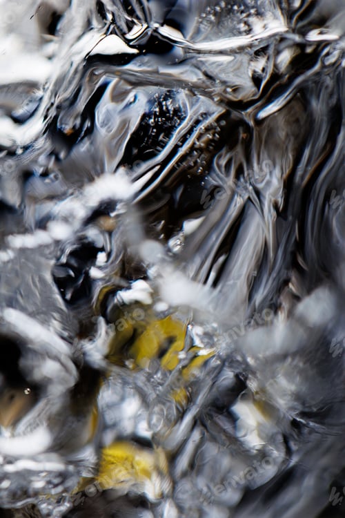 Preview: Vertical shot of clear water splashing wave motions