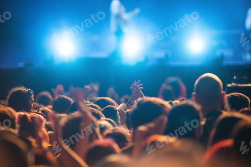 Preview: crowd partying stage lights live concert summer music festival