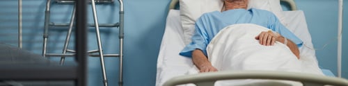 Preview: Resting Patient in Hospital Bed Receiving Medical Care