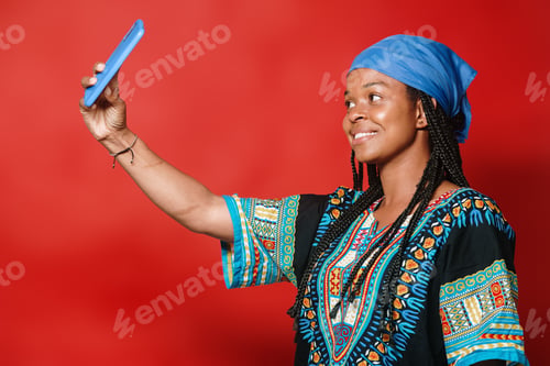 Preview: Black young girl taking a selfie