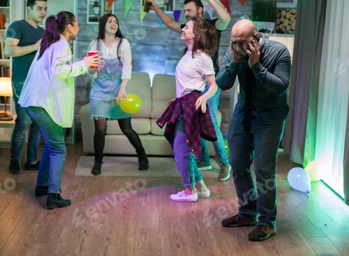 Preview: Man trying to have a conversation on his phone