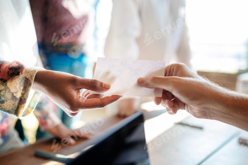 Preview: People getting a ballot at a polling place