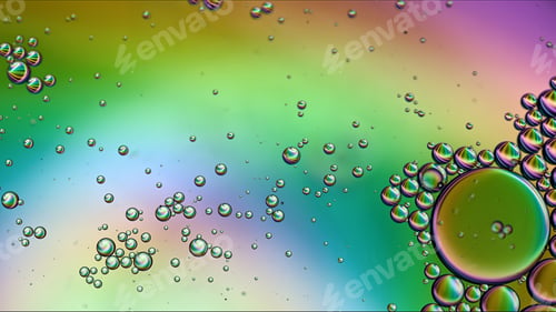 Preview: Abstract Colorful Food Oil Drops Bubbles and spheres Flowing on Water Surface