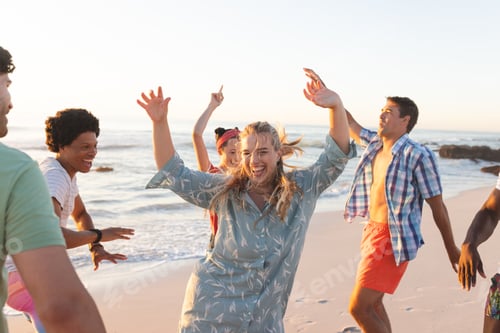 Preview: Friends enjoy a lively beach party at sunset