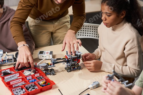 Preview: Girl making a robot at science lesson