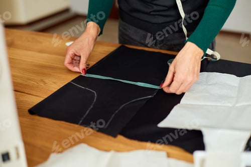 Preview: Step by step, woman dressmaker female measuring sewing pattern On Table