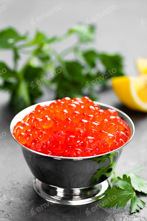 Preview: Red salmon fish caviar, salmon caviar in metal bowl. Caviar. Selective focus
