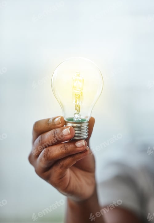 Preview: Brilliant Idea: Adult Holding a Glowing Lightbulb