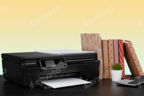 Preview: Compact home laser printer against yellow background