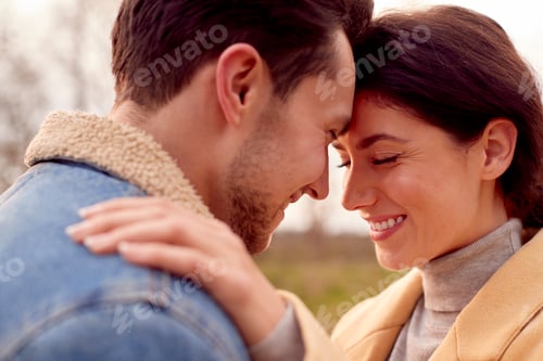 Preview: Loving Transgender Couple Enjoying Walk In Autumn Or Winter Countryside
