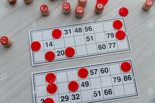 Preview: Traditional Russian board game Russian Lotto. Cards with numbers, closeup.