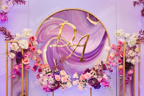Preview: Wedding decor with the initials of the bride and groom and flowers