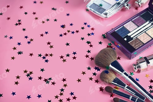 Preview: Makeup brush and cosmetics on a pink background
