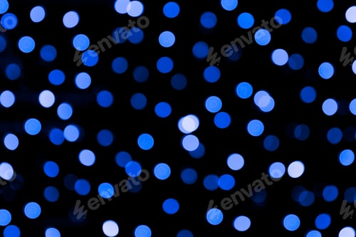 Preview: Unfocused abstract colourful bokeh black background. defocused and blurred many round blue light