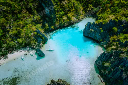 Preview: Amazing aerial view of turquoise Cadlao lagoon hopping island El Nido Palawan Philippines. Stunning