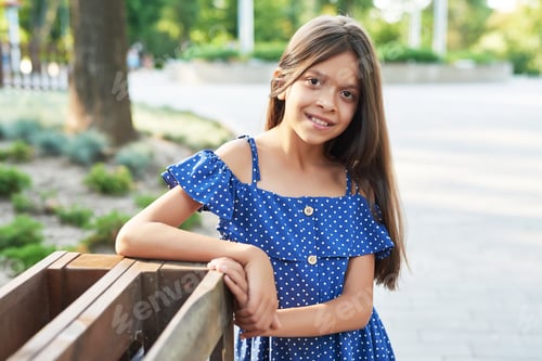 Preview: Girl in the summer garden on a picnic