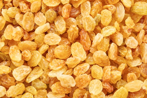 Preview: Golden raisins as background. Top view, food background