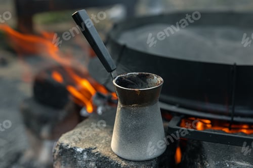 Preview: Close-up of a Turk with coffee on a blurred background.