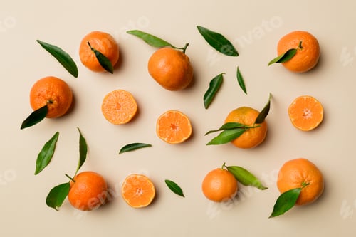 Preview: Many fresh ripe mandarin as colored background, top view. Elegant background