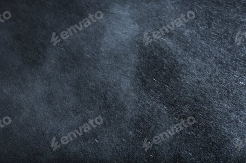 Preview: Rain drops falling down against dark background