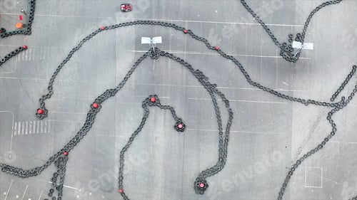 Preview: Aerial drone view on racing go-kart track, motorsport concept. Media. Sportsmen participating in the