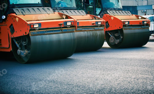 Preview: Road roller working on the new road construction site