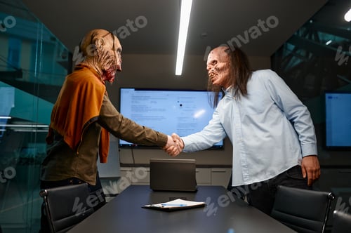 Preview: Zombie businessmen handshake to confirm deal