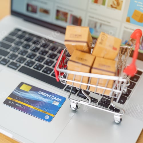 Preview: Boxes with credit card on a laptop computer.
