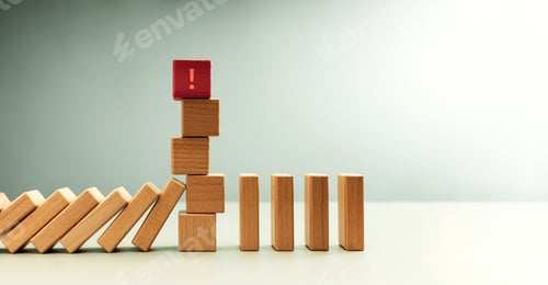 Preview: Red wooden block with exclamation mark standing among dominoes