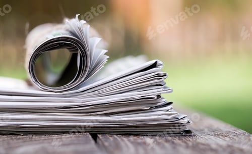 Preview: Morning newspaper close-up