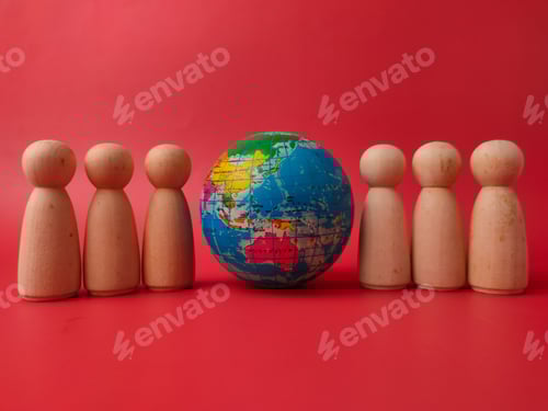 Preview: Earth-shaped stress ball surrounded by small wooden figures