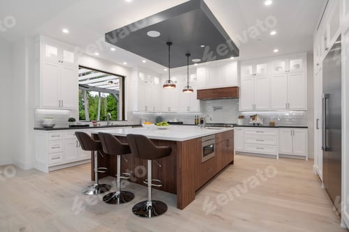 Preview: a kitchen with two bar stools next to a marble countertop