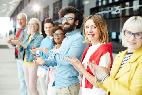 Preview: Successful people clapping hands in line