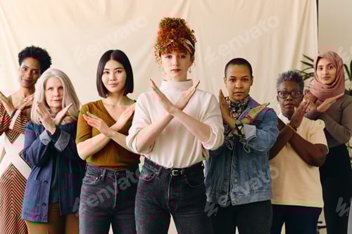 Preview: Young white woman gesturing Break The Bias in support of International Women's Day