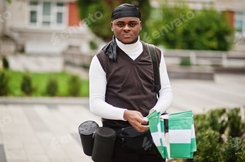 Preview: Young african man hold flag