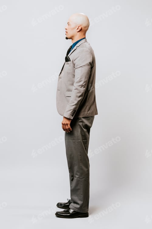 Preview: Businessman full body side portrait