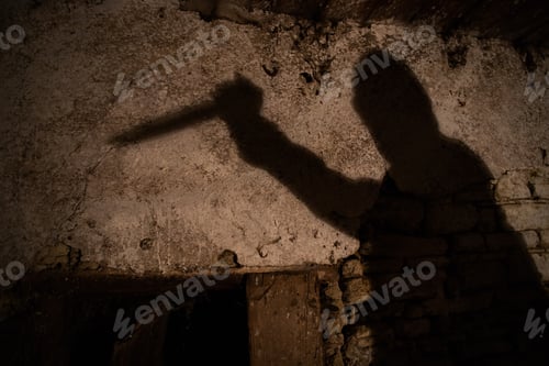 Preview: murderer with big knife and shadow horror scene