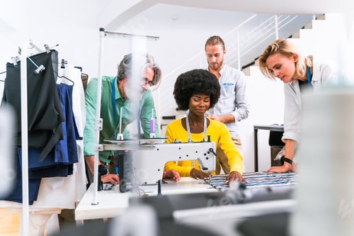 Preview: Team of fashion designers at work