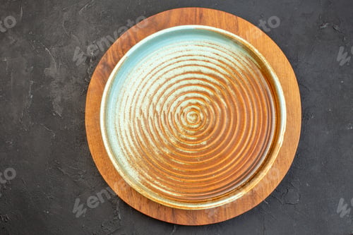 Preview: top view brown plate on wooden cutting board dark background color cuisine kitchen meal food ceramic
