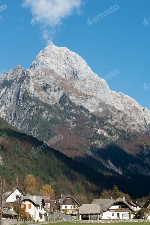 Preview: Scenic view of Log pod Mangartom with majestic lulian alps peak in the background.