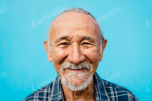 Preview: Happy senior man having fun looking and smiling into the camera - Elderly people lifestyle concept