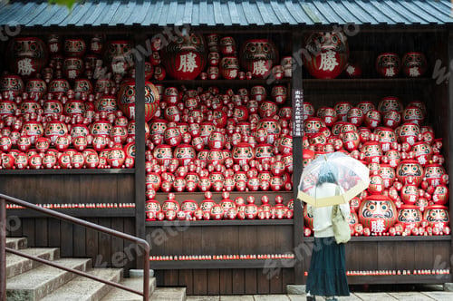 Preview: A vibrant image showcasing a crowd of Darumas in the streets of Osaka