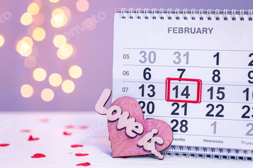 Preview: Calendar with the date February 14, a festive background for Valentine's Day.