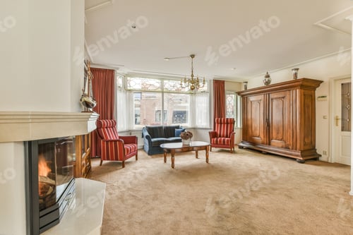 Preview: a living room filled with furniture and a fireplace