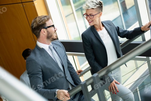 Preview: Business people having fun in modern office