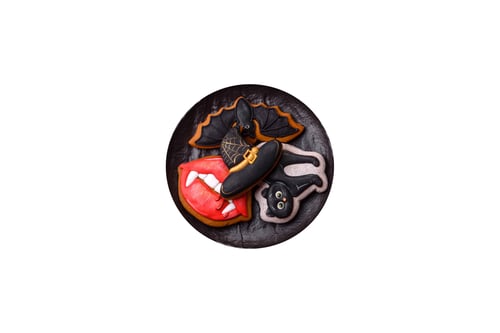 Preview: Halloween cookies, sweets, or gingerbread, a cat, a bat, and a hat. Halloween gingerbread